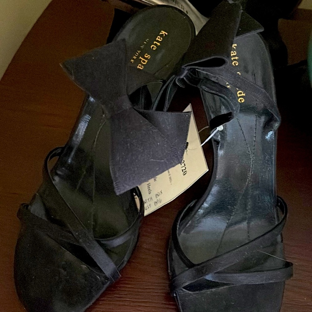 Kate spade black satin heels with bow detail at back